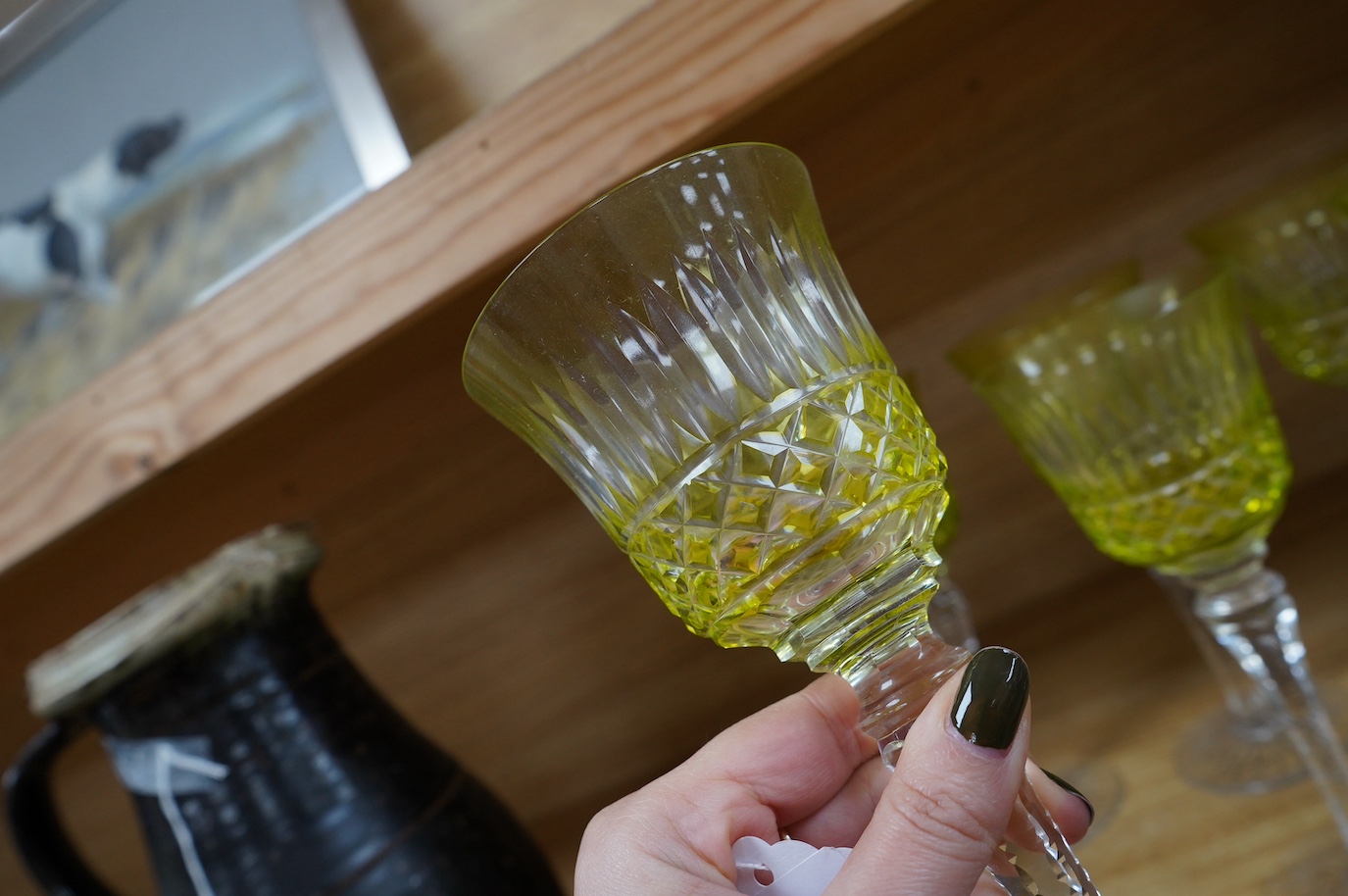 A set of six green cut glass hocks, 20.5cm high. Condition - good